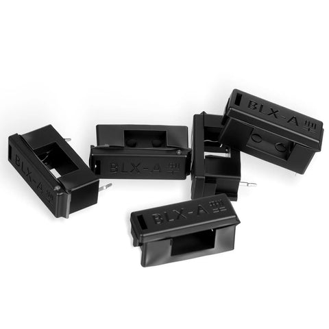 30 Pack 5 X 20 mm PCB Fuse Holder Kit Black Plastic Mount With Cover scattered in a pile for circuit protection and repairs