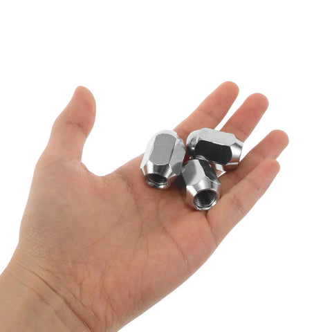 Top Tier MERRYHAPY 16 Piece Acorn Style ATV Wheel Nut Kit For Quad Dirt Bike Trailers With Heavy Duty Metal Construction Ensuring Ultimate Durability And Super Easy Installation For Your Off Road Adventures, silver nuts in hand