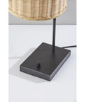 Bahama Table Lamp With Dark Bronze Finish for Warm Coastal Modern Vibes, showing the dark bronze base and rattan shade detail
