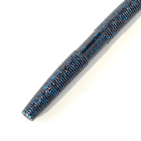 Close-up of a soft plastic bass lure from the 5 Inch Soft Plastic Bass Lures Pack 24 Count Green Pumpkin With Black Flake Pink Watermelon Double Color Natural Fall Action For Wacky Rig Texas Rig Neko Rig Versatile Freshwater Bass Fishing.