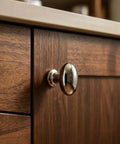 Top Shelf Slick Titanium Silver Mushroom Cabinet Knobs And Drawer Pulls For Kitchen Bathroom And Dresser Crafted From Rock Solid Zinc Alloy With Polished Chrome Finish Modern Minimalist Furniture Hardware 6 Pack Set close-up on wooden cabinet.