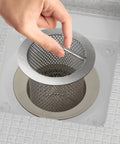 Person lifting Heavy Duty 3 Inch Commercial Floor Drain Strainer Basket With Thick Stainless Steel Build Finely Polished Finish Rust Resistant