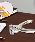 Hisxrcal T Shape Hole Punch Handheld Slot Cutter Tool For Card Name Tags Scrapbooking Projects Easy Portable Design on a desk with notebook.