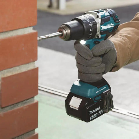 Heavy-Duty 18V Brushless Cordless Drill And Driver Combo Kit With Two 5.0Ah Lithium Batteries Fast Charger And Rugged Case for drilling into brick.