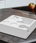 Heavy Duty Coffee Tamper Station With Pop Out Grounds Container, Clean White Espresso Tamping Holder on a kitchen counter.