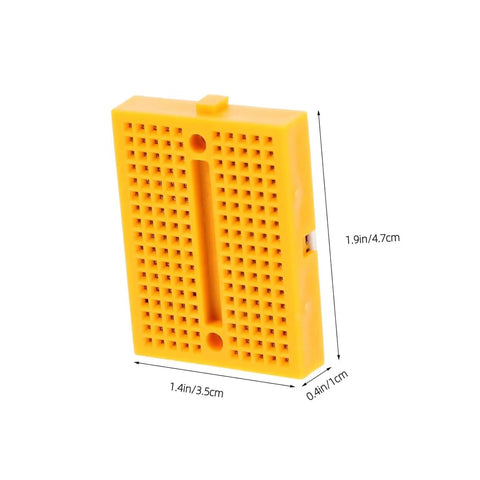 Hella Handy Six Piece Solderless Breadboard Kit in yellow, compact for circuit prototyping, measures 1.9in x 1.4in x 0.4in.