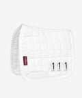 Miniature Toy Pony Dressage Saddle Pad With Soft Suede And Cotton Lining Removable Competition Numbers Perfect Gift For Kids Aged 3 And Up White One Size Realistic Practice Gear For Little Riders quilted texture and competition numbers.