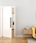24 Inch Barn Door Push Pull Pro Grade Handle Set in Matte Black Stainless Steel on white door in modern living room