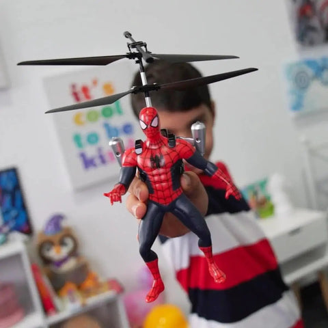 Child holding Spider Man Infrared RC Helicopter Jetpack Flying Figure With LED Lights Twin Rotors Action Phrases Marvel Licensed Toy