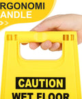 Hand holding 8 Pack Caution Wet Floor Signs, 17.5 Inch Yellow Safety Warning Signs For High Traffic Areas with ergonomic handle