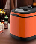 Portable Countertop Ice Maker Machine Rapid Six Minute Freeze boosts weekend crews with 44 pounds daily, sleek orange design.