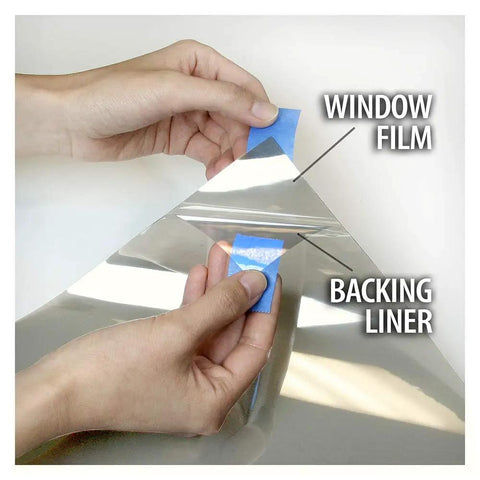 Close-up of hands peeling backing from Very Light Window Film With High Heat Rejection And UV Cut 36 Inch By 14 Foot Roll Durable Scratch Resistant Tint