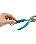Hand holding pliers with Squids 3180 Tool Tethering Kit For 2lb Tools ANSI ISEA 121-2018 Compliant Ultra Strength Nylon Coiled Lanyard System