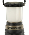 Siege AA 200-Lumen Lantern With White And Red LEDs For Camping And Emergencies Featuring High Medium And Low White Modes Plus Red LED And SOS For Emergency Signaling Night Vision Friendly And Compact Outdoor Light Coyote showing front view with handle and control button.