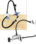Beefy Flexible Metal Arm Soldering Clamp With Adjustable Multi Angle Stand shown clamped to table with PCB in grip