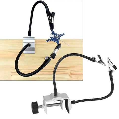 Beefy Flexible Metal Arm Soldering Clamp With Adjustable Multi Angle Stand shown clamped to table with PCB in grip