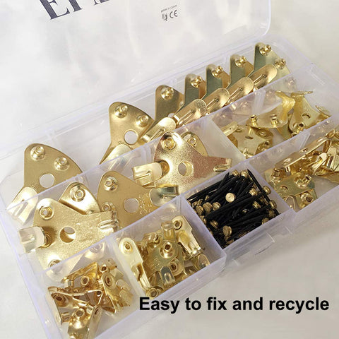 Heavy Duty 125 Piece Picture Hanging Kit With Tough Nails And Wall Anchors For Drywall And Wood Surfaces Handles Big Canvas Loads Like A Champ Every Single Time, gold hooks and nails in organized container.