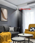 12 Pack Swanky LED Recessed Downlights Brushed Brass And Black Gold Finish 5W 7W Spotlight Fixture on living room ceiling.