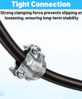 Heavy Duty Zinc Wire Clamps Bulk Pack Of Fifty Secure Electrical Box Connectors With Ironclad Strain Relief Fittings close-up of clamp securing thick black wire.