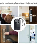 Ultra Loud 120dB Door Sensor Alarm For Home, Travel And Hotels, Touch, Vibration And Magnet Detection For Kids Safety, Luggage, Backpack, And Security, Instant Alerts When Door Opens black sensor hanging on door handle