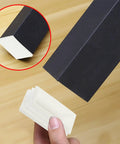Close-up of a square tube with 20 Pack White Plastic Square Tube Plugs for chair and table legs, focus on end caps.