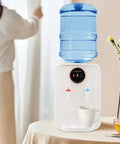 Countertop Hot And Cold Water Dispenser With 4.99 Gallon Tank Top Loading Electric Cooler And Heater Auto Temp in kitchen setting