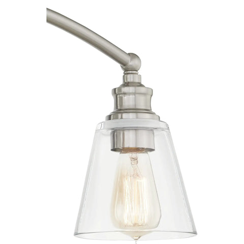 Close-up of Sottile Vanity Light in Brushed Nickel showing single bulb and glass shade, part of Three Light Bar for Bathrooms.