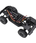 Upgraded One Eighteenth Scale RC Crawler Chassis Frame For AX-8560 TRX4 M Bronco Defender Nylon Build with visible axles and wiring.