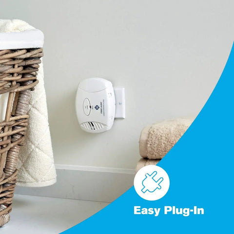 Carbon Monoxide Detector Plug In Alarm With Battery Backup CO606 White 1 Pack installed in wall outlet for home safety