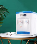 Hot And Cold Water Desktop Dispenser For 1.3 To 5 Gallon Jugs Top Loading Countertop Cooler on a table