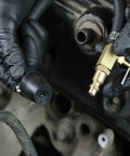 Close-up view of tool from Two Valve Triton Spark Plug Thread Repair Kit With No Brainer System For Ford engines being installed