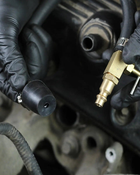 Close-up view of tool from Two Valve Triton Spark Plug Thread Repair Kit With No Brainer System For Ford engines being installed