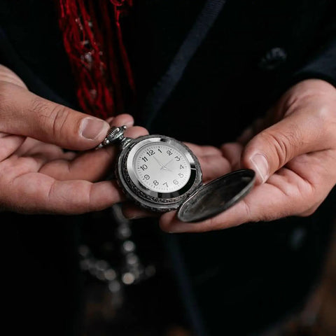 Person holding a pocket watch featuring the 55mm Clock Face Insert With Arabic Numerals For Watch Repair And Upgrades.