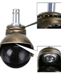 Close-up of 2 Inch Grip Ring Swivel Ball Caster Wheels For Furniture with antique brass finish showing details of steel and PP design.