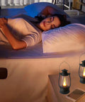 5.1 Inch Mini Lanterns Six Pack LED Candle Lanterns For Indoor Outdoor Decor illuminating a bedroom bedside, creating a warm ambiance