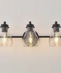 Black Three Light Vanity Light Fixture With Clear Glass Shades For Bathroom Over Mirror, modern lighting front view