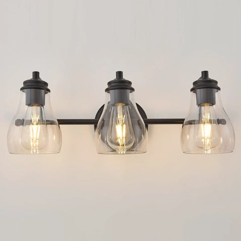 Black Three Light Vanity Light Fixture With Clear Glass Shades For Bathroom Over Mirror, modern lighting front view