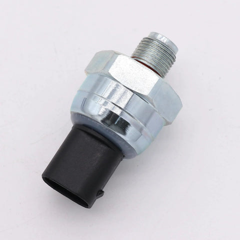 Brake fluid pressure sensor, silver hex-metal body with threaded port and black plastic connector (side view).