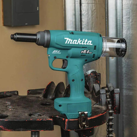 Badass 18V Lithium Ion Brushless Cordless Rivet Tool With Tough As Nails 20 KN Pulling Force For Quick One Stroke Installation Of Quarter Inch Aluminum And Steel Rivets Tool Only side view on workbench