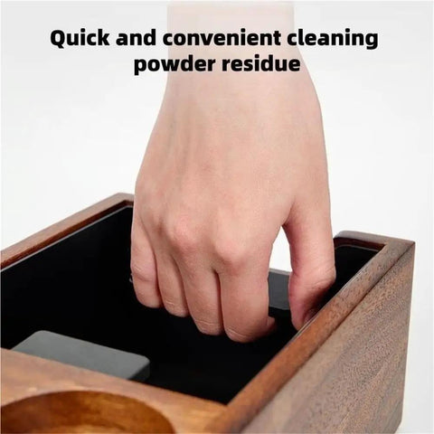 Hand removing coffee powder residues from Heavy Duty Wooden Espresso Knock Box With 58mm Tamper Base Zero Hassle Setup.