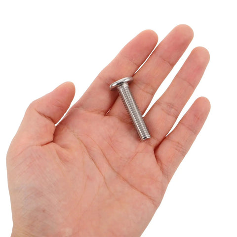 Hand holding a single screw from Beefy 20 Pack M8x35 Hex Socket Cap Screws Fully Threaded Bolts For Cat Tree Spare Parts And Furniture Connectors Replacement