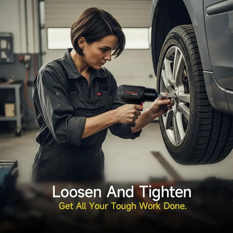 No Nonsense 1/2 Inch Air Impact Wrench Featuring Killer Torque Specs And Rock Solid Magnesium Alloy Composite Housing For Legit Garage Grinds And Daily Heavy Duty Drives Delivering Up To 1600 Ft Lbs Of Raw Pull For Real Pro Shop Work in use by a worker loosening a lug nut on a car wheel.