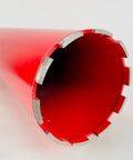 Front view of a 5-inch diamond wet core drill bit with red body and segmented teeth