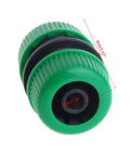Close-up of green Garden Hose Connector Mender And Extend Repair Adapter Kit For Quick Leak Fix Joins One Half Inch Hose Sections