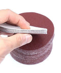 Heavy Duty Assorted Sandpaper Discs With Hook And Loop For Power Drill Grinder Sets 240 Grit Aluminum Oxide, showing stack of discs.