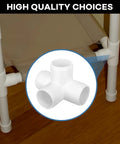 4 Way PVC Fittings 1 Inch 12 Pack Heavy Duty Furniture Grade Pipe Connectors, shown assembled in a DIY structure in a home workshop