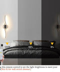 Modern Hardwired LED Wall Sconce Set Of Two With Remote Control, RC Dimmable Black Indoor Wall Lights in bedroom, showing dimming levels.