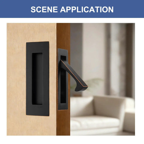 Slick Recessed Pocket Door Hardware Set With Flushing Edge Pull And Two Legit Heavy Duty Slide Handles For Smooth Closet Barn Door Operation In Top Shelf Oil Rubbed Bronze Finish on wooden door with modern interior.