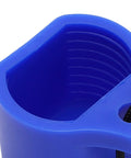 Close-up of blue threaded rubber scuba tank valve cap shield for dust and sand protection, showing inner grooves and loop attachment.