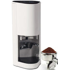 Professional Espresso Tamper Machine Height Adjustable 58 Mm Stainless Steel Automatic Coffee Press With Touchscreen Force Control next to coffee grounds.